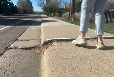 Sidewalk that Contains Deflections at least 5 feet wide